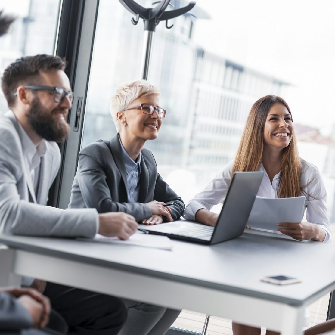 Business meeting of three C-Level Executives
